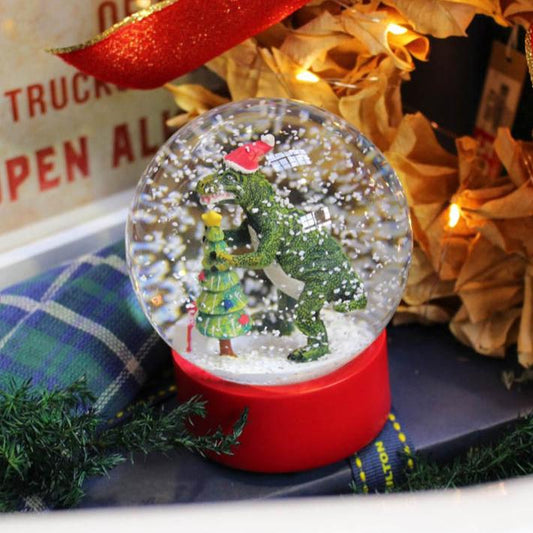 ツリーを見守る恐竜サンタ