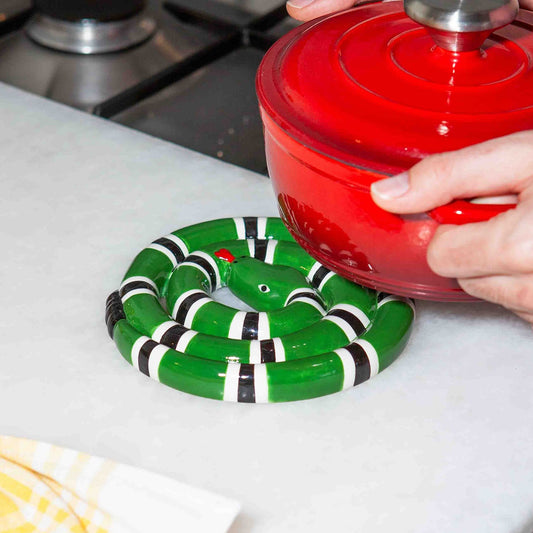 ペロっと顔のラッキー鍋敷き